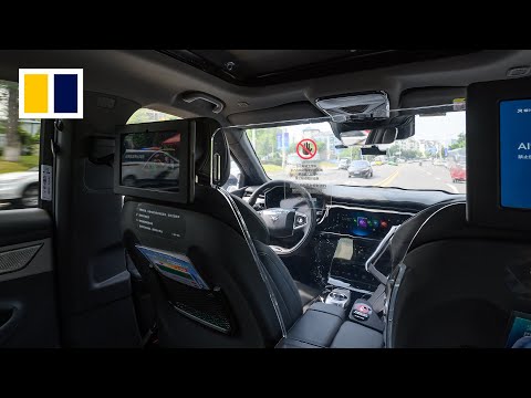 Test riding China’s AI-driven robotaxis