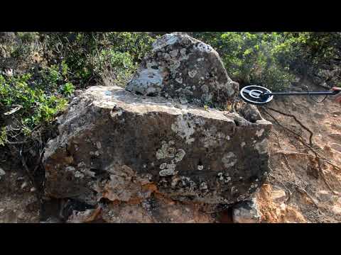 TREASURES ENCLOSED IN BIG ROCKS { found with metal detector }