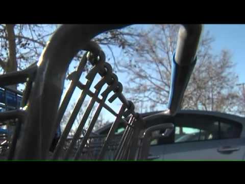 People putting razor blades on walmart shopping carts