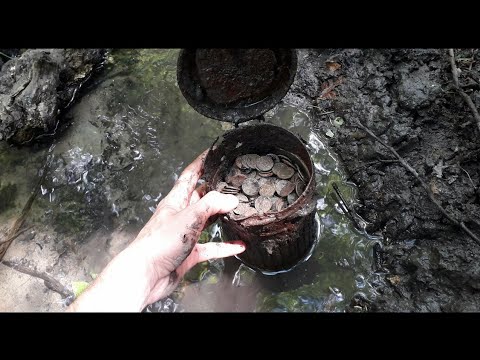 Treasure in the stream. Metal detecting and relic hunting with metal detector.