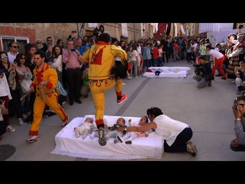 Traditional baby jumping festival in Spain