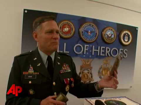 Raw Video: Army Colonel Eats 40-year-old Cake