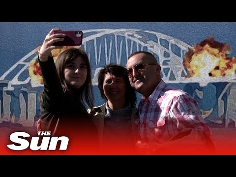 Ukrainians celebrate as explosion destroys Crimea bridge crucial to Russia