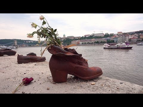 WHY ARE THERE SHOES ON THE EDGE OF THE DANUBE?