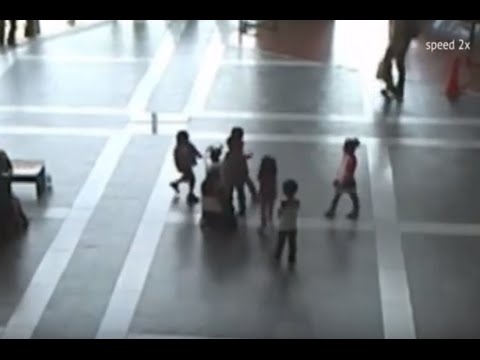 Robot Tries to Escape from Children&#039;s Attack