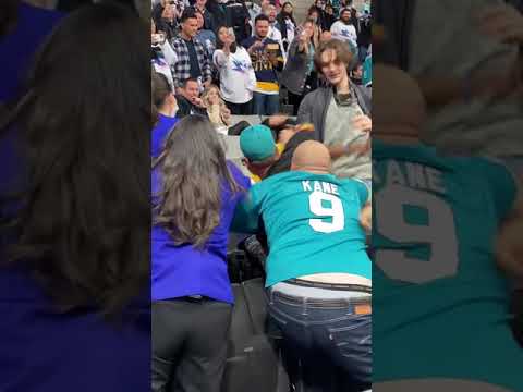 Fans fight at the San Jose Sharks vs Nashville Predators game March 5, 2022