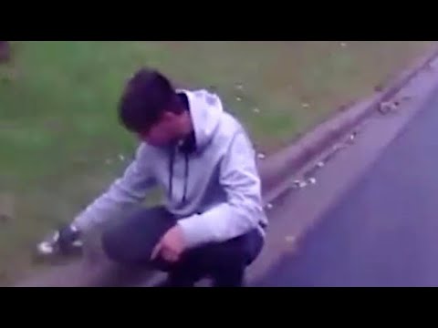 Police bodycam footage captures man giving squirrel CPR on side of road