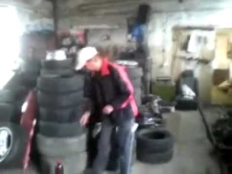 Guy Gets Blown In The Air By An Air Bag In A Tyre