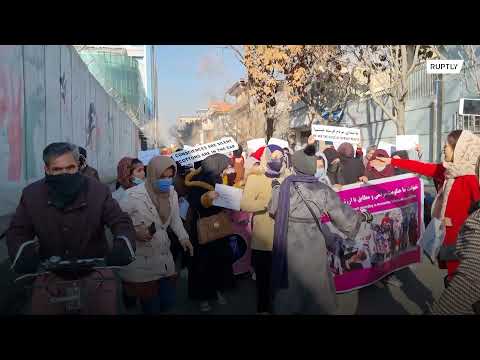 Afghan women protest against travel restrictions issued by Taliban