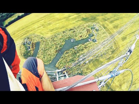 lineman climbing 260ft transmission tower