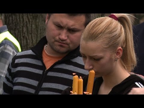 Serbia buries 13 victims of shooting spree