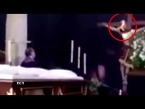 Shocking moment crucified Jesus statue moves its head during Good Friday Mass