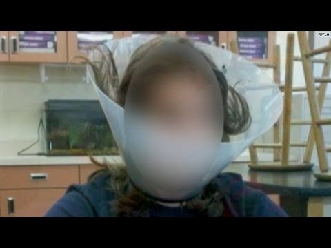Teacher puts cone of shame on students?!
