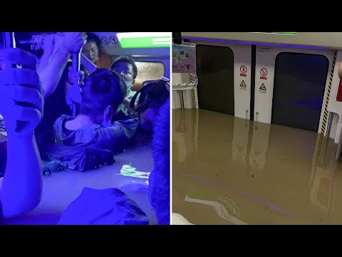 Passengers trapped in flooded subway in China