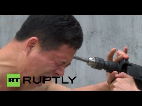 China: ELECTRIC DRILL no match for this Shaolin Kung Fu Master!