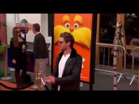 Zac Efron Drops A CONDOM On The Lorax Premiere Orange Carpet