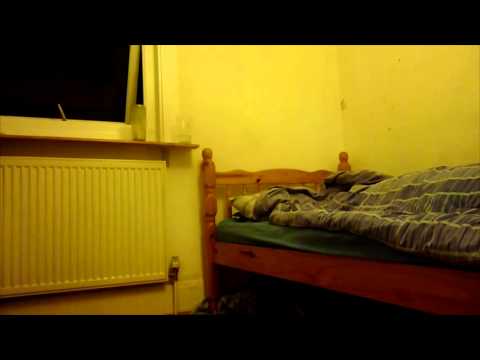 Man films ghostly manifestation hovering over bed while he s