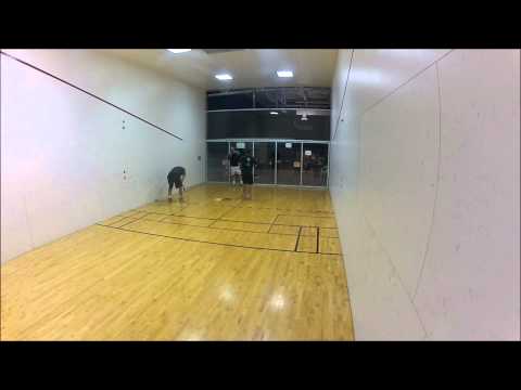 Mike gets hit by a racquetball