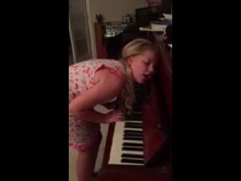 Young Kiwi girl playing the piano while sleepwalking.