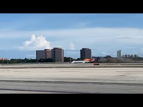 Cellphone video captures jetliner skidding across MIA tarmac