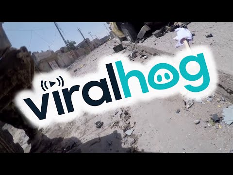 Iraqi Journalist&#039;s GoPro Deflects a Sniper&#039;s Bullet || ViralHog