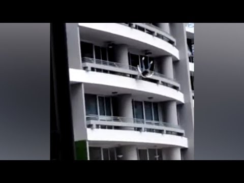 Woman falls to her death while sitting on 27th floor balcony railing for a selfie