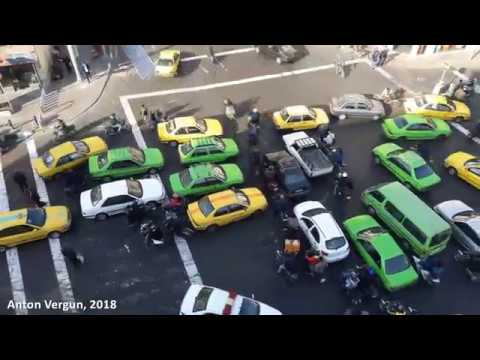 Intuition driving in Iran. Tehran incredible cross-road traffic