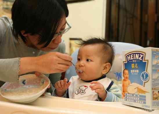 A-Mother-Is-Feeding-Heinz-Baby