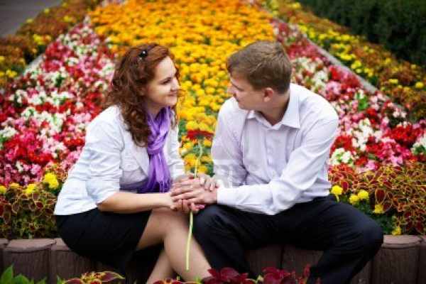 11559185-Romantic-Date-Young-People-In-The-Flower-Park