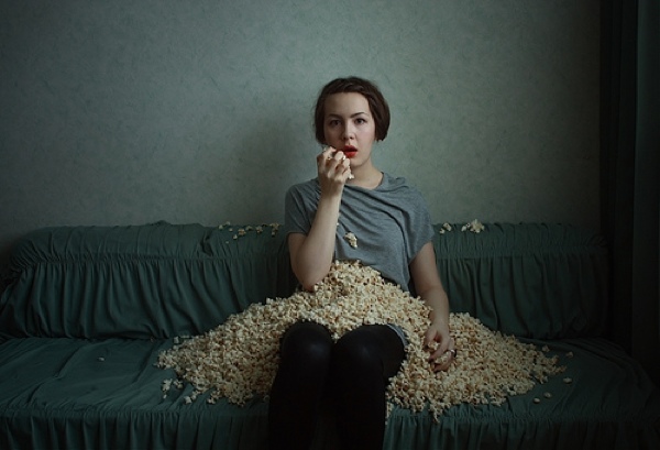 Depressed Girl Eats Popcorn