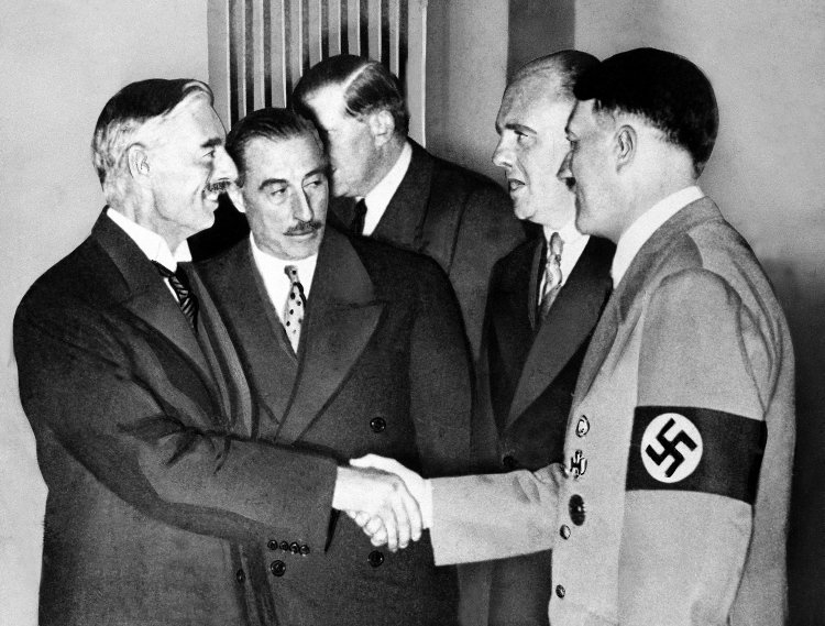 Adolph Hitler         and     Neville Chamberlain