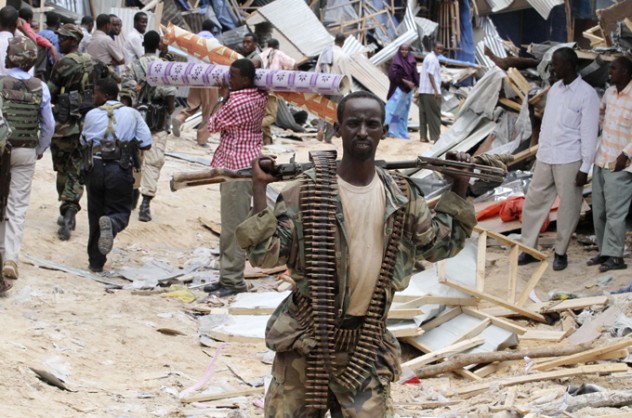 A Somali government soldier patrols a section of Bakara market in Mogadishu