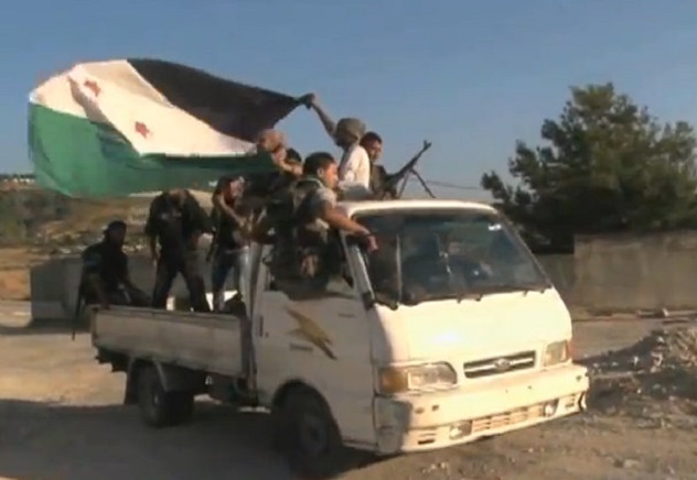 FSA_soldiers_in_truck_moving
