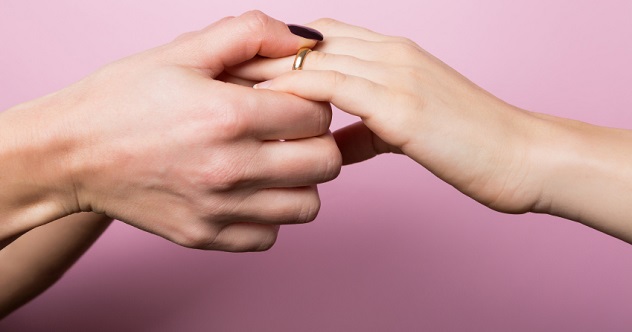 Women Partners Exchanging Rings in Engagement for St. Valentine