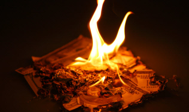 6a-burning-up-money_11355948_SMALL