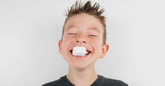6a-boy-eating-marshmallow_22222484_SMALL