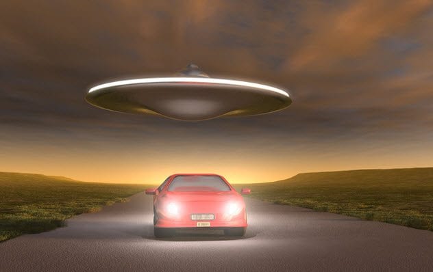 7a-flying-saucer-chasing-car-178090909