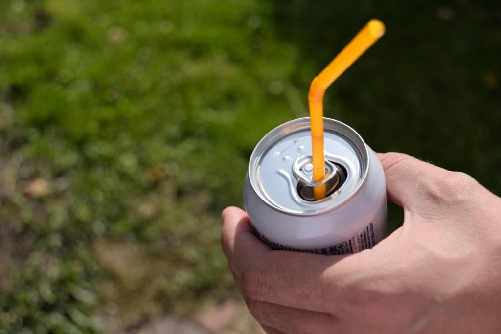 Was the soda can tab really invented to hold the straw in place